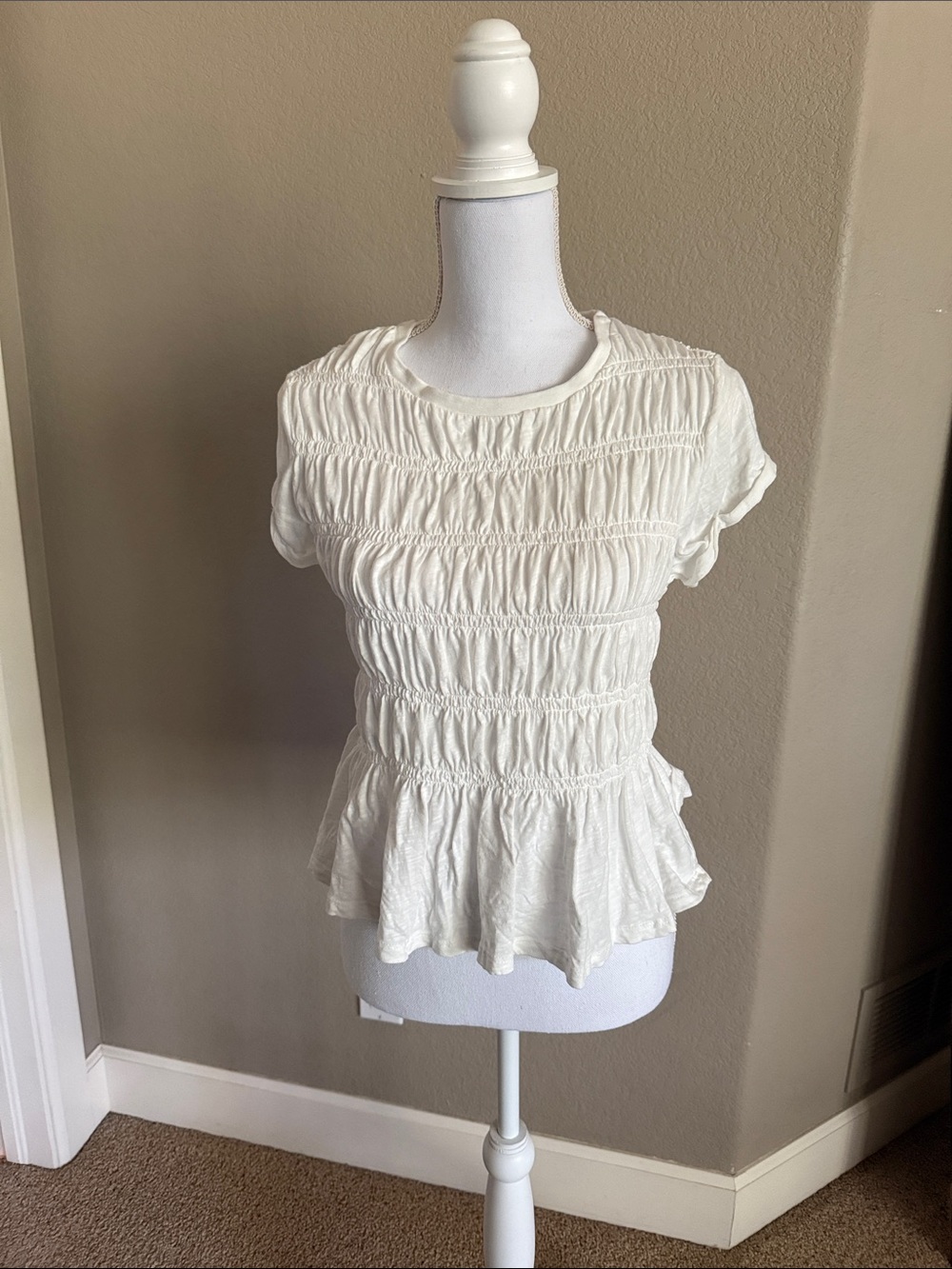 Anthropologie Cream Smocked Peplum Short Sleeve Top